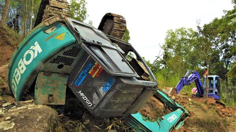 mini digger tipped over|mini excavators tipping over.